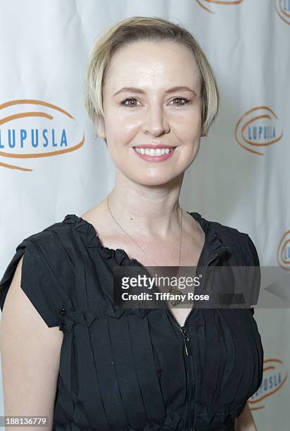 Actress Caroline Carver attends the Hollywood Bag Ladies Luncheon on November 15, 2013 in Beverly Hills, California.