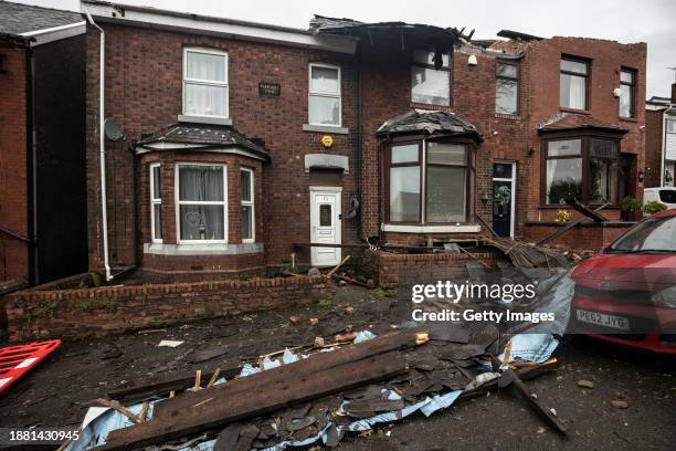 Roofs can be seen ripped off homes on Hough Hill Road following a tornado on December 28, 2023 in Stalybridge, England. Houses in the Tameside area...