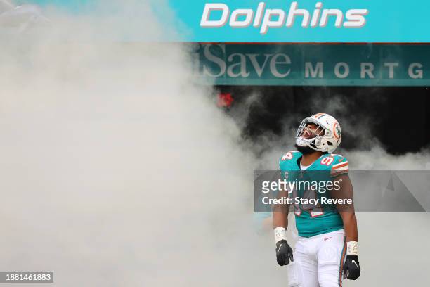 Christian Wilkins of the Miami Dolphins takes the field during player introductions prior to a game against the Dallas Cowboys at Hard Rock Stadium...