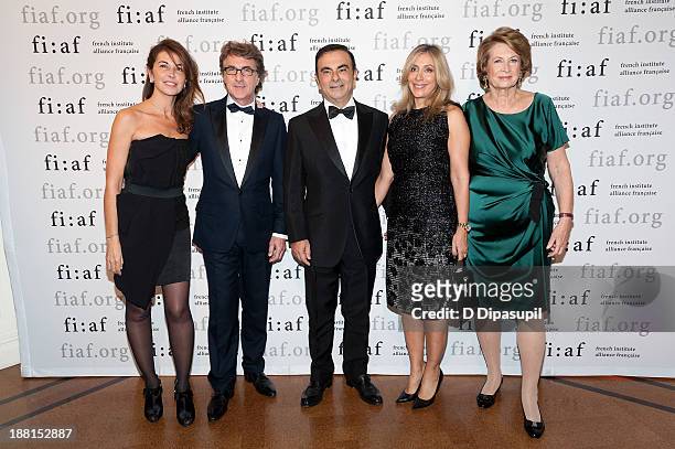 Narjiss Cluzet, Francois Cluzet, Carlos Ghosn, Carole Nahas, and Marie Monique Steckel attend the 2013 Trophee Des Arts gala on November 15, 2013 in...