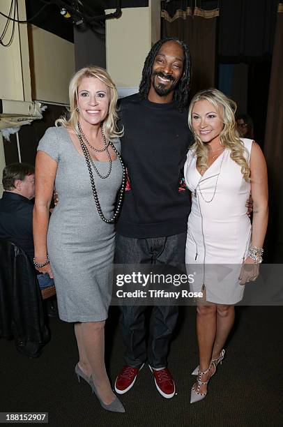 Marla & Nicole Paxson and Snoop Lion attend the Hollywood Bag Ladies Luncheon on November 15, 2013 in Beverly Hills, California.