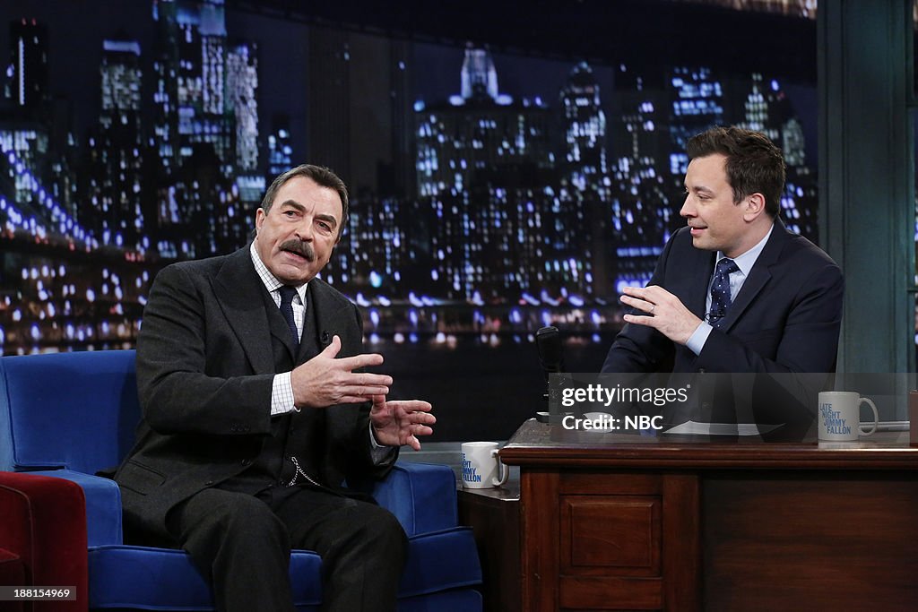 Jimmy Fallon Roles Tom Selleck with host Jimmy Fallon during an interview on Friday ...