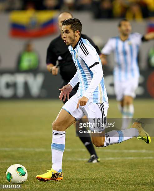 Ricardo Alvarez of Argentina takes the ball in the first half against Ecuador during a friendly match at MetLife Stadium on November 15, 2013 in East...