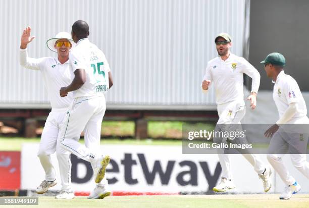 Rohit Kagiso Rabada of South Africa bowls Rohit Sharma of India out and celebrate with his teammates during day 3 of the 1st test match between South...