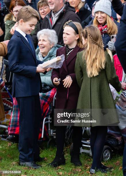 Prince George of Wales, Mia Tindall and Princess Charlotte of Wales attends the Christmas Morning Service at Sandringham Church on December 25, 2023...