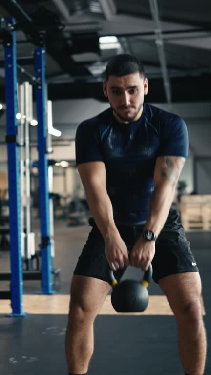 https://media.gettyimages.com/id/1882718862/video/determined-muscular-male-athlete-in-sportswear-doing-kettlebell-swing-exercise-at-gym.jpg?b=1&s=640x640&k=20&c=SE5o3An6rqZphKiWRRfs9cZ6bVcChCNSblqWzOjtgsM=