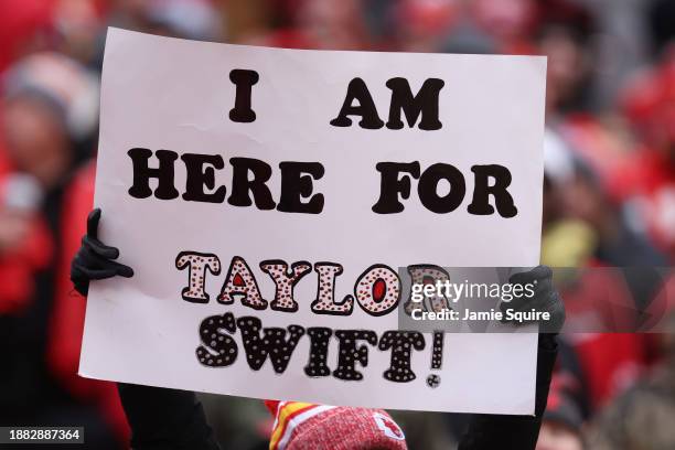 Fans display signs in support of Taylor Swift during a game between the Las Vegas Raiders and the Kansas City Chiefs at GEHA Field at Arrowhead...