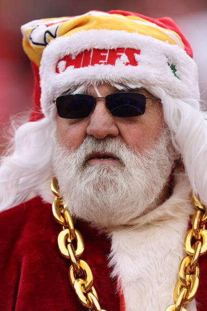 Fan is seen dressed as Santa Claus during a game between the Las Vegas Raiders and the Kansas City Chiefs at GEHA Field at Arrowhead Stadium on...