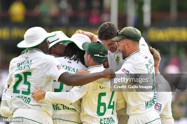 South African players celebrate their victory over India during day 3 of the 1st test match between South Africa and India at SuperSport Park on...