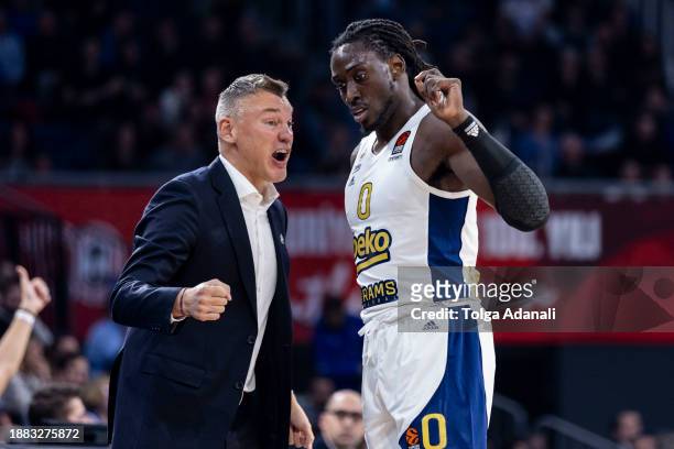 Sarunas Jasikevicius, Head Coach of Fenerbahce Beko Istanbul in action with Johnathan Motley, #0 of Fenerbahce Beko Istanbul during the Turkish...