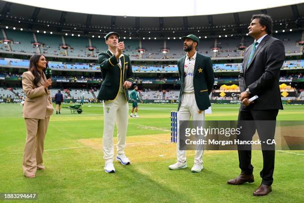 Pat Cummins of Australia and Shan Masood of Pakistan at the coin toss during day one of the Second Test Match between Australia and Pakistan at...