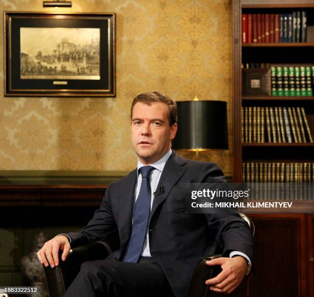 This picture taken on July 24, 2009 shows Russian President Dmitry Medvedev gesturing as he gives an interview to Russian television channel NTV at...