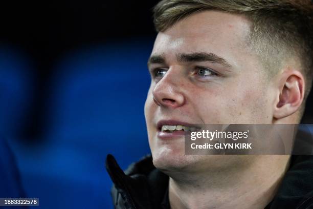 Brighton's Irish striker Evan Ferguson reacts from the bench during the English Premier League football match between Brighton and Hove Albion and...