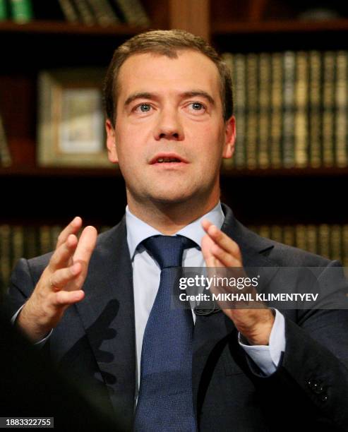 This picture taken on July 24, 2009 shows Russian President Dmitry Medvedev gesturing as he gives an interview to Russian television channel NTV at...