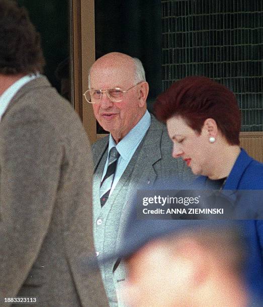 South-Africa's former apartheid-era President P.W. Botha, accompanied by his daughter Elanza Maritz, leaves the Magistrate's Court in George 03 June,...