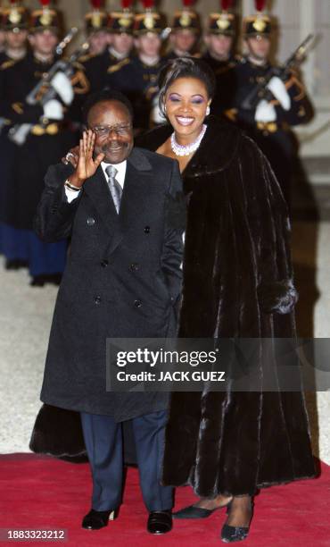 Gabonese President Omar Bongo and his wife Edith Lucie arrive 20 February 2003 at the Palais de l'Elysée in Paris, before an official diner. Heads of...