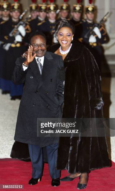 Gabonese President Omar Bongo and his wife Edith Lucie arrive 20 February 2003 at the Palais de l'Elysée in Paris, before an official diner. Heads of...