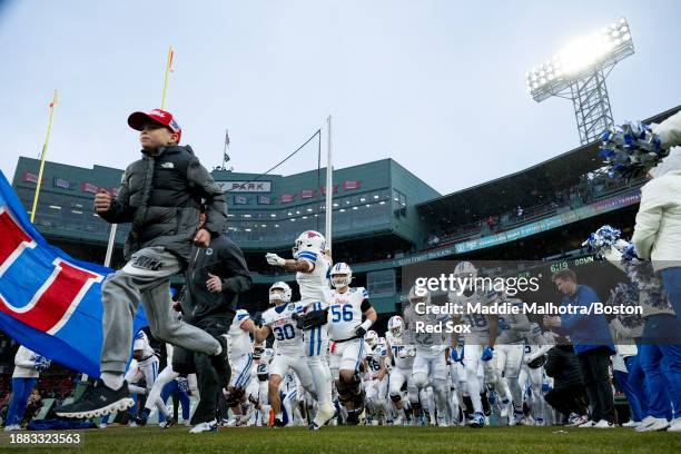 The Southern Methodist Mustangs take the field for the 2023 Wasabi Fenway Bowl between the SMU Mustangs and the Boston College Eagles on December 28,...