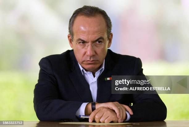 Mexican President Felipe Calderon presents the Mexican Genome Map at the presidential residencia Los Pinos in Mexico City, on May 11, 2009. AFP...