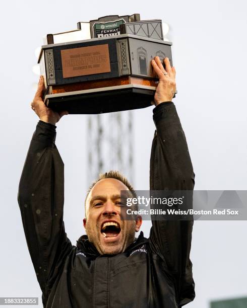 Head coach Jeff Hafley of the Boston College Eagles reacts as he lifts the trophy after a victory during the 2023 Wasabi Fenway Bowl against the...