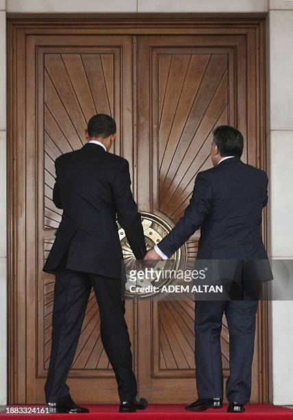 President Barack Obama is greeted by his Turkish counterpart Abdullah Gul during a welcoming ceremony at Cankaya Palace in Ankara on April 6, 2009....