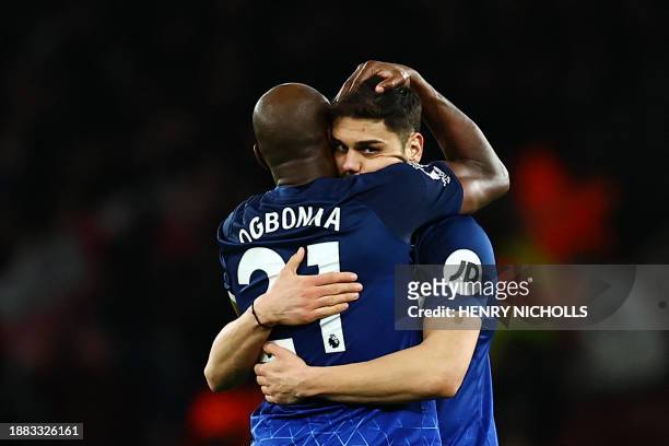 West Ham United's Italian defender Angelo Ogbonna celebrates with West Ham United's Greek defender Konstantinos Mavropanos at the end of the English...