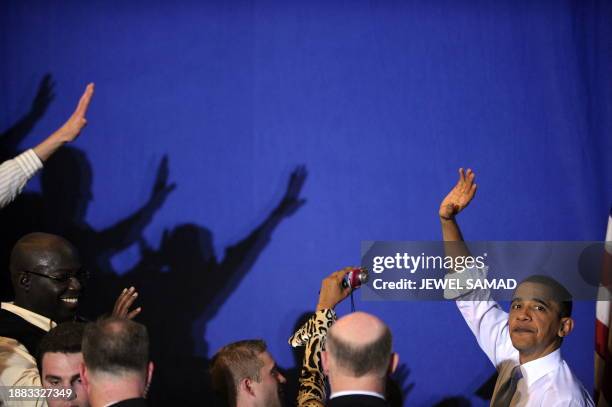 President Barack Obama waves after speaking on health insurance reform at the Portland Expo Center in Portland, Maine, on April 1, 2010. AFP...