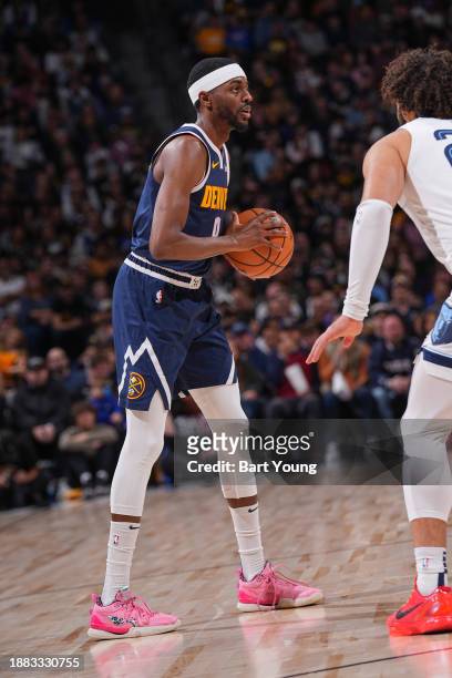 Justin Holiday of the Denver Nuggets handles the ball during the game on December 28, 2023 at the Ball Arena in Denver, Colorado. NOTE TO USER: User...