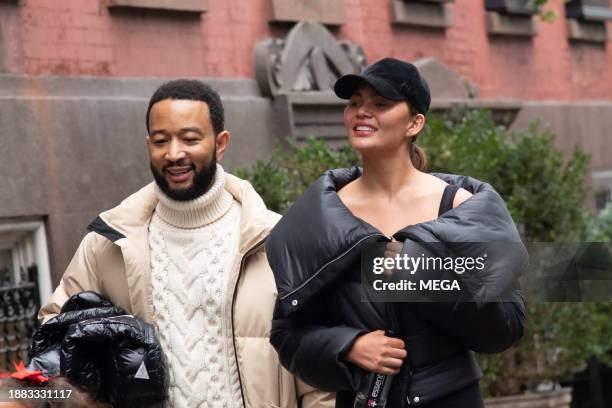 Chrissy Teigen and John Legend are seen out and about on December 28, 2023 in New York, New York.