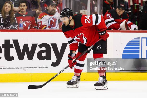 New Jersey Devils defenseman Colin Miller looks on during a game between the Columbus Blue Jackets and New Jersey Devils on December 27, 2023 at...