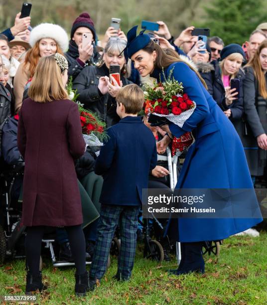 Mia Tindall, Prince Louis of Wales and Catherine, Princess of Wales attend the Christmas Morning Service at Sandringham Church on December 25, 2023...