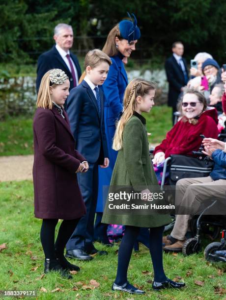 Mia Tindall, Prince George of Wales, Catherine, Princess of Wales and Princess Charlotte of Wales attend the Christmas Morning Service at Sandringham...