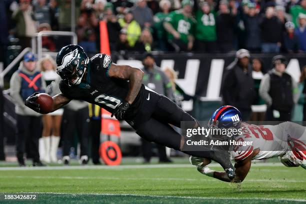 Andre Swift of the Philadelphia Eagles scores a touchdown against Xavier McKinney of the New York Giants during the fourth quarter at Lincoln...