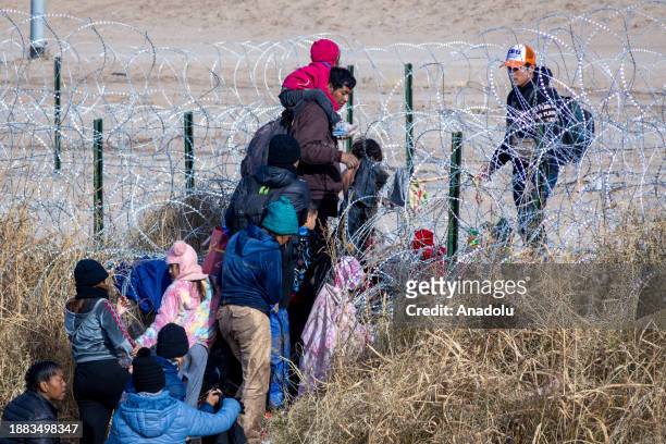 Hundreds of migrants are attempting to reach the United States border to seek humanitarian asylum in Ciudad Juarez, Mexico on December 28, 2023. In...