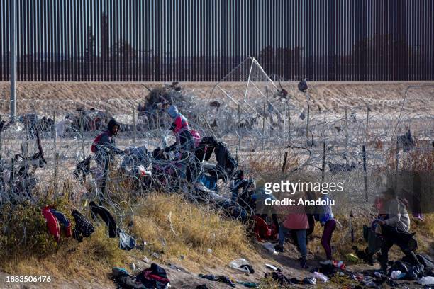 Hundreds of migrants are attempting to reach the United States border to seek humanitarian asylum in Ciudad Juarez, Mexico on December 28, 2023. In...