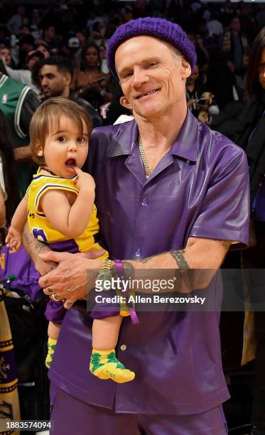 Flea and his son Darius Booker Balzary attend a basketball game between the Los Angeles Lakers and the Boston Celtics at Crypto.com Arena on December...