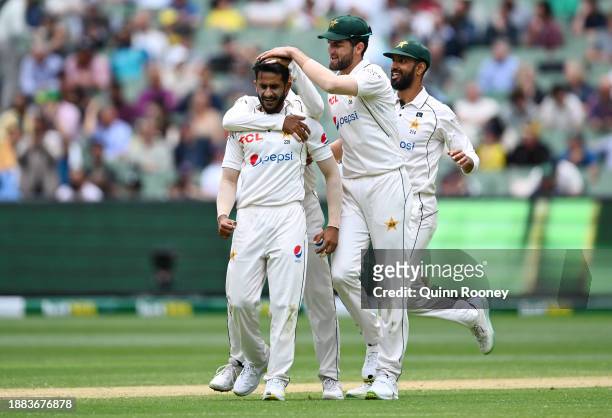 Hasan Ali of Pakistan celebrates with teammates after dismissing Usman Khawaja of Australia during day one of the Second Test Match between Australia...