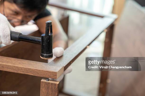 craftsmen with furniture wooden table at home - careerbuilder challenge stock pictures, royalty-free photos & images