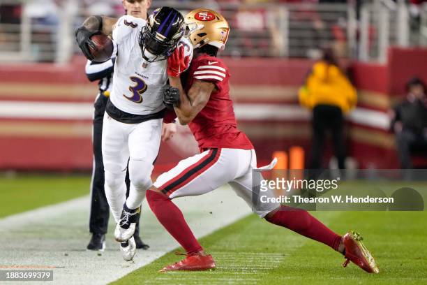 Charvarius Ward of the San Francisco 49ers pushes Odell Beckham Jr. #3 of the Baltimore Ravens out of bounds during the second quarter at Levi's...