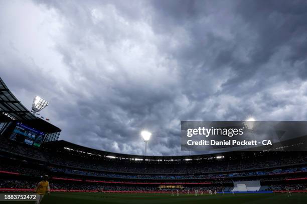 Storm clouds are seen above the stadium during day one of the Second Test Match between Australia and Pakistan at Melbourne Cricket Ground on...