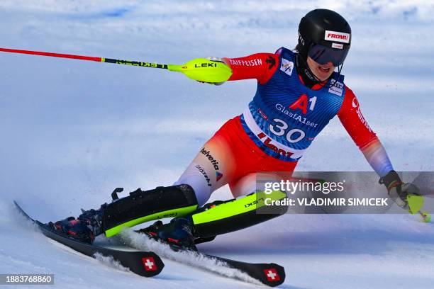 Switzerland's Nicole Good competes in the first run of the Women's Slalom race at the FIS Alpine Skiing World Cup event on December 29, 2023 in...