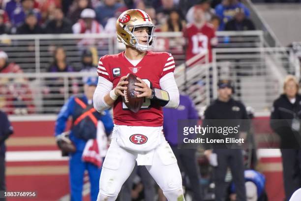 Brock Purdy of the San Francisco 49ers attempts a pass against the Baltimore Ravens during the third quarter at Levi's Stadium on December 25, 2023...