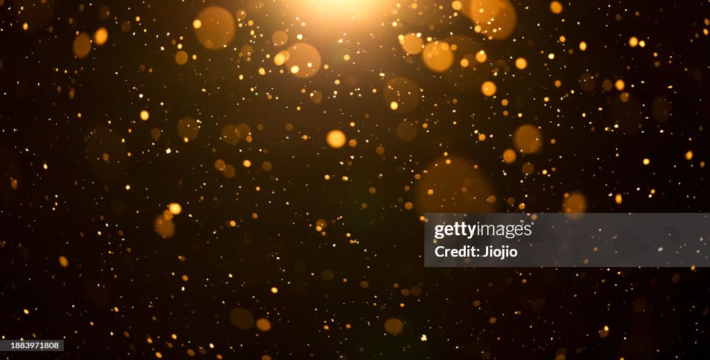Falling Snowflakes under a streetlight at night
