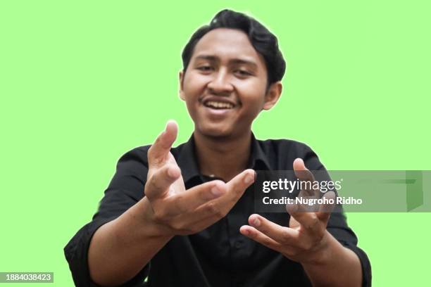 young handsome businessman discuss with hand gesture and smile - executive smile pointing bildbanksfoton och bilder