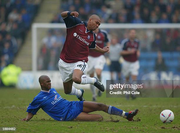 Darren Bent of Ipswich gets tackled by Leon Johnson of Gillingham during the Nationwide first Division match between Gillingham and Ipswich Town at...