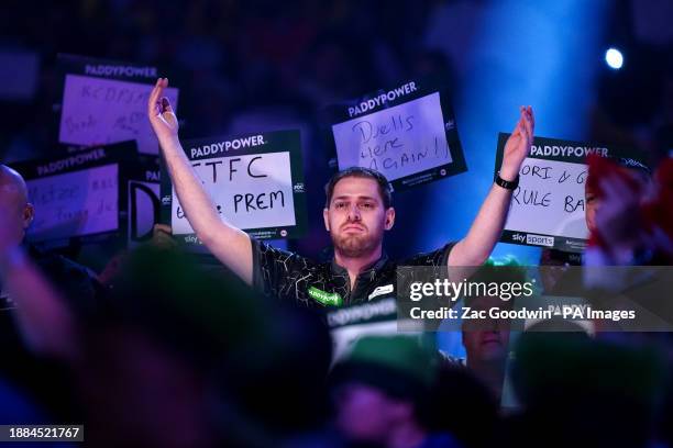 Berry van Peer walks out to play against Damon Heta on day twelve of the Paddy Power World Darts Championship at Alexandra Palace, London. Picture...