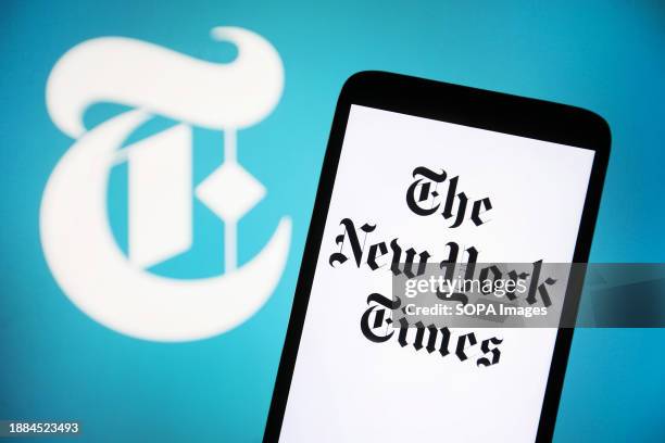 In this photo illustration, The New York Times logo is seen on a smartphone screen.