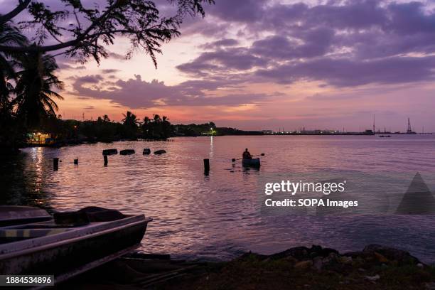 Fishing boats are seen on the shore of Lake Maracaibo. After being exploited for intense oil extraction for decades, Lake Maracaibo has become...