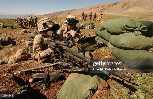 Paratroopers of the 173rd Airborne Brigade secure the Hareer Airbase March 29, 2003 near Erbil, in northern Iraq. U.S.-led forces parachuted into the...