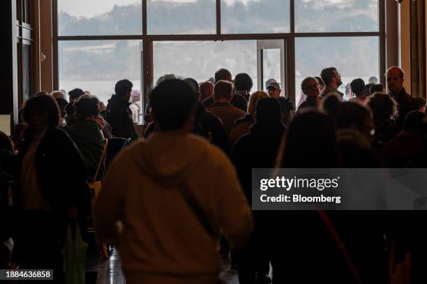 Residents and visitors inside the Ferry Building in San Francisco, California, US, on Thursday, Dec. 28, 2023. San Francisco is seeing a trickle of...